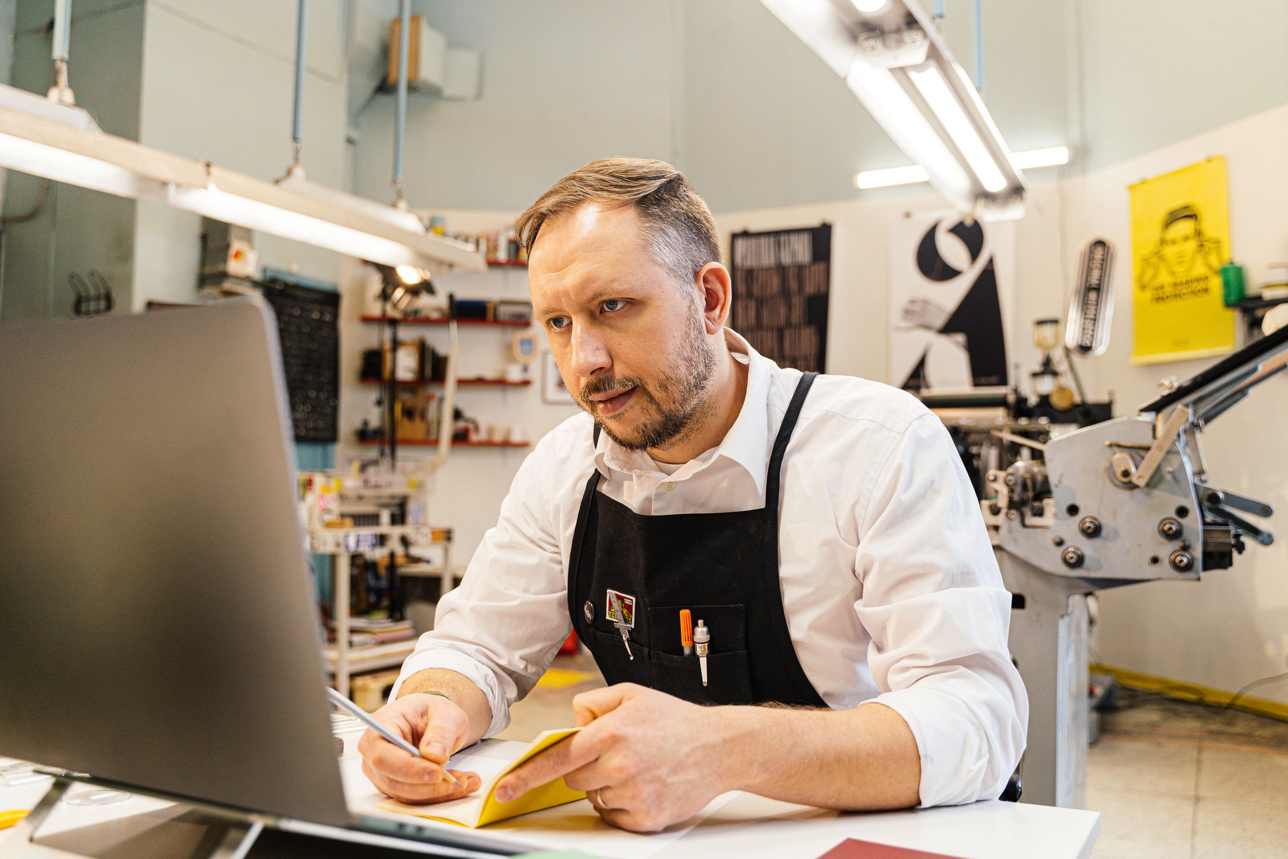 Photo of a small business owner working at his computer