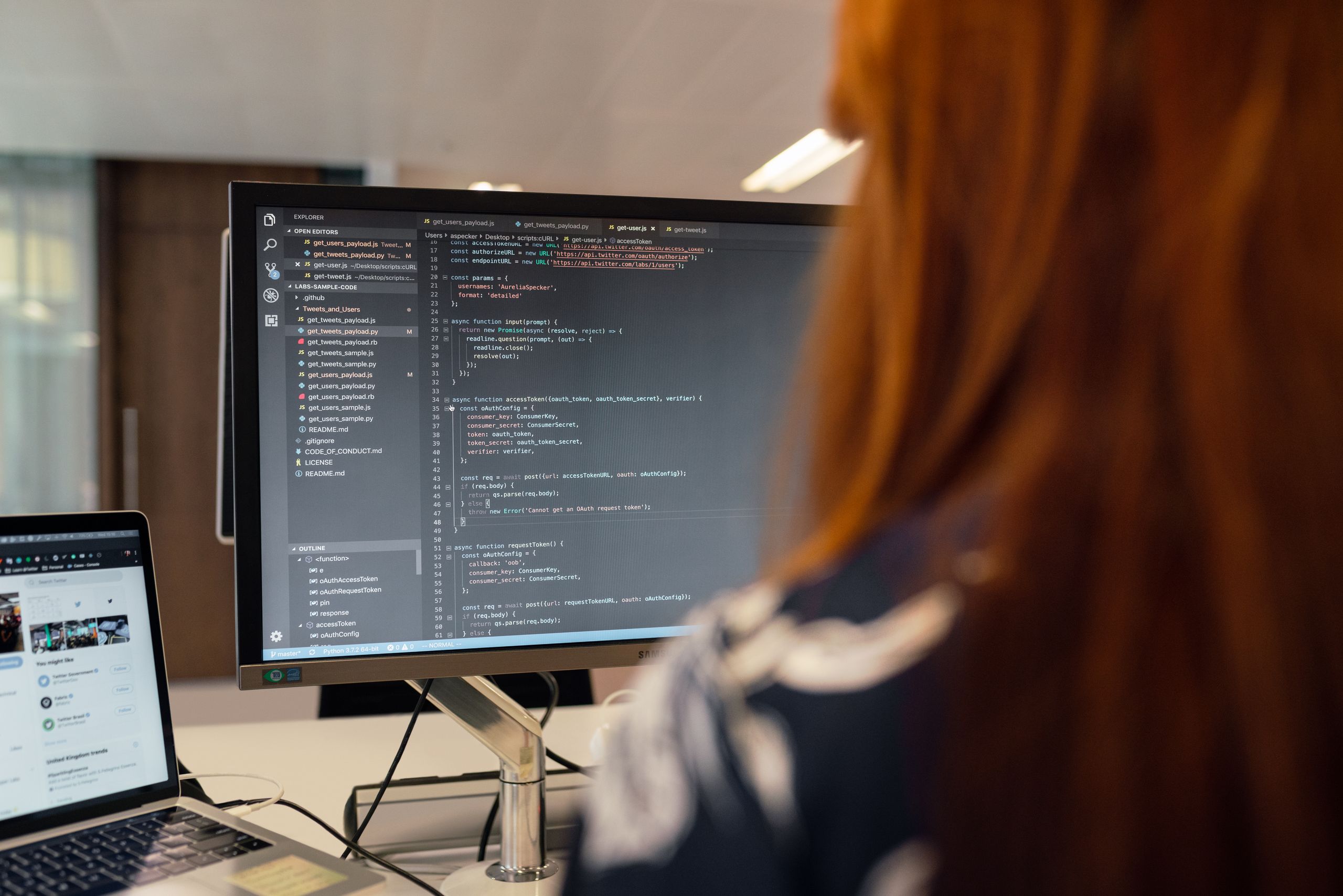 Photo of an engineer working on code